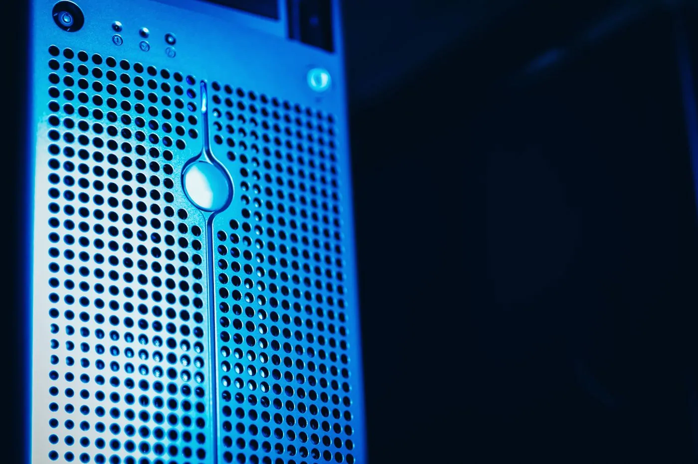Close view of blue-lit server hardware in a data center
